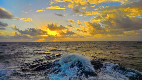 Ocean Sunset: Captivating Waves & Golden Sky Bliss Print