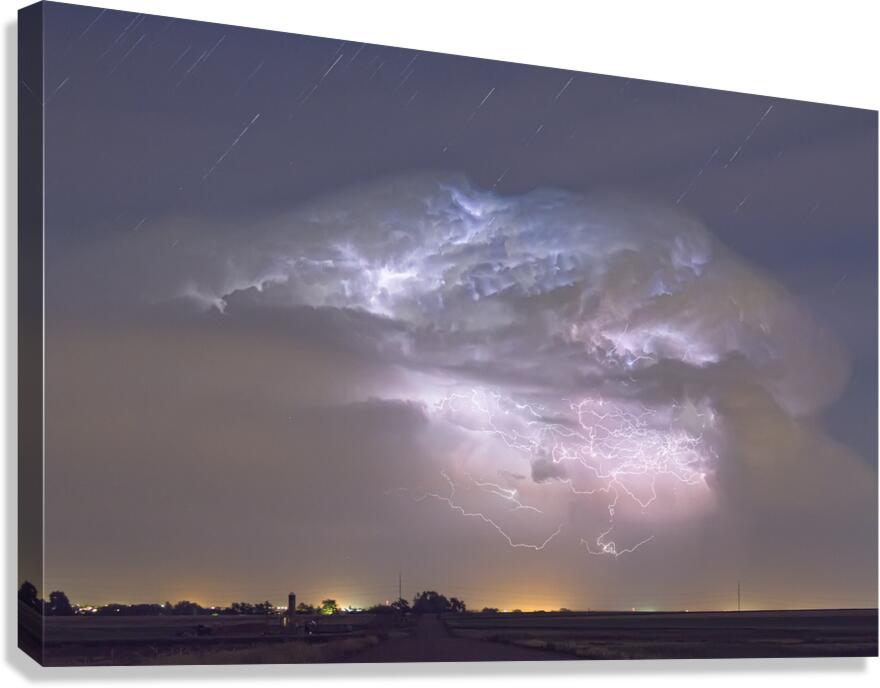 Cumulo nimbus Lightning Storm and Star Trails Above Canvas Print
