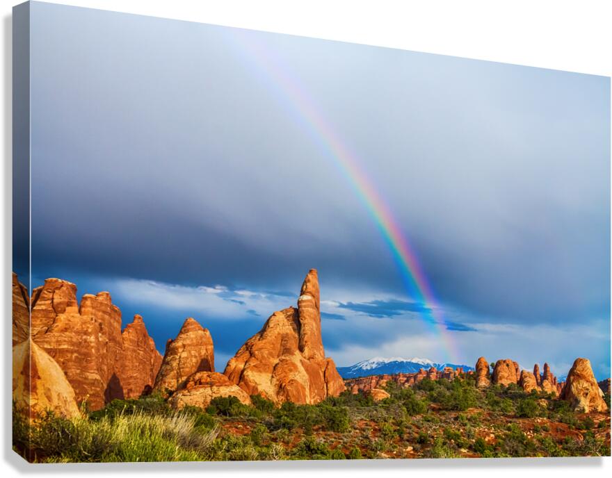 A Rainbows Light Over Utahs Desert Spires Canvas Print