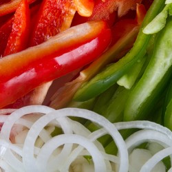 Raw Red Peppers Green Peppers and Onions