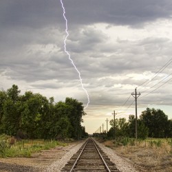 Lightning Striking By The Train Tracks